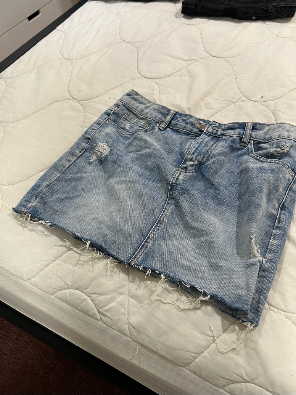 Light Wash Distressed Denim Mini Skirt